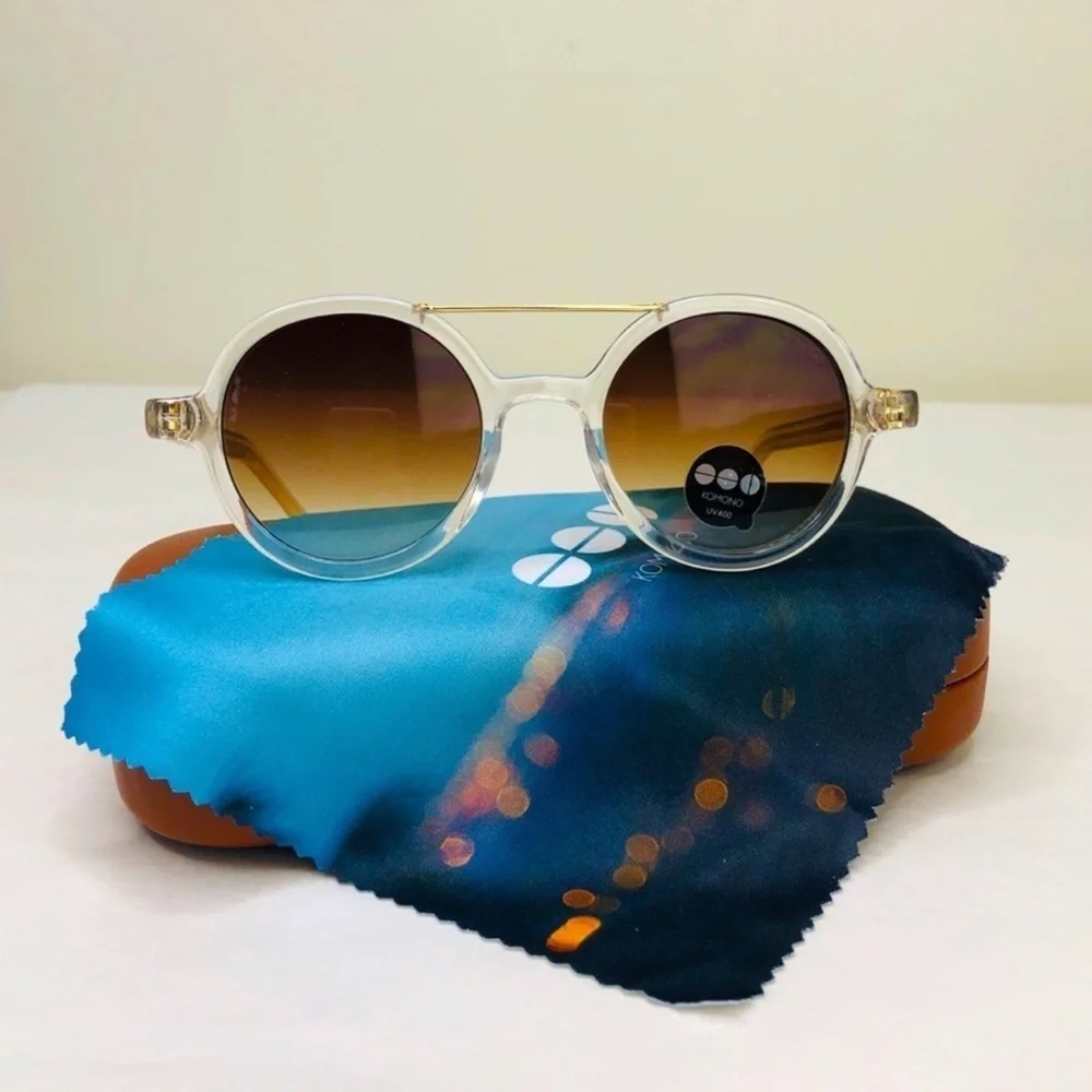 KOMONO Round Clear Sunglasses with Brown Gradient Lenses The Vivien